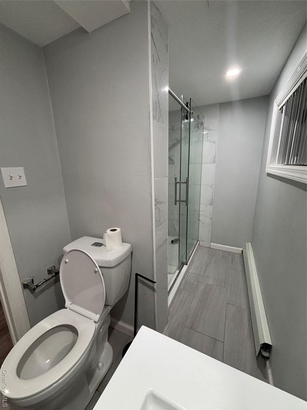Bathroom, Glass Shower, Interior, Recessed Lighting, Wood Texture Flooring