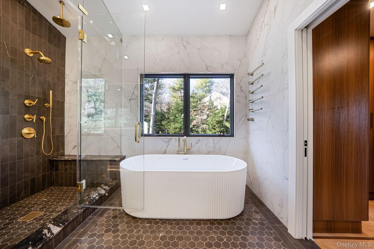 Bathroom, Free Standing Baths, Glass Shower, Interior, Marble Walls, Recessed Lighting