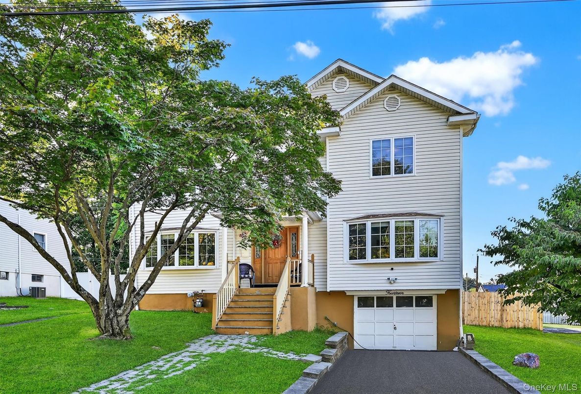 Attached, Exterior, Facade, Raised Ranch