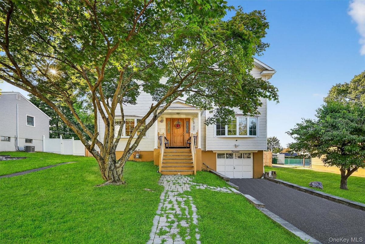 Attached, Backyard, Exterior, Facade, Raised Ranch