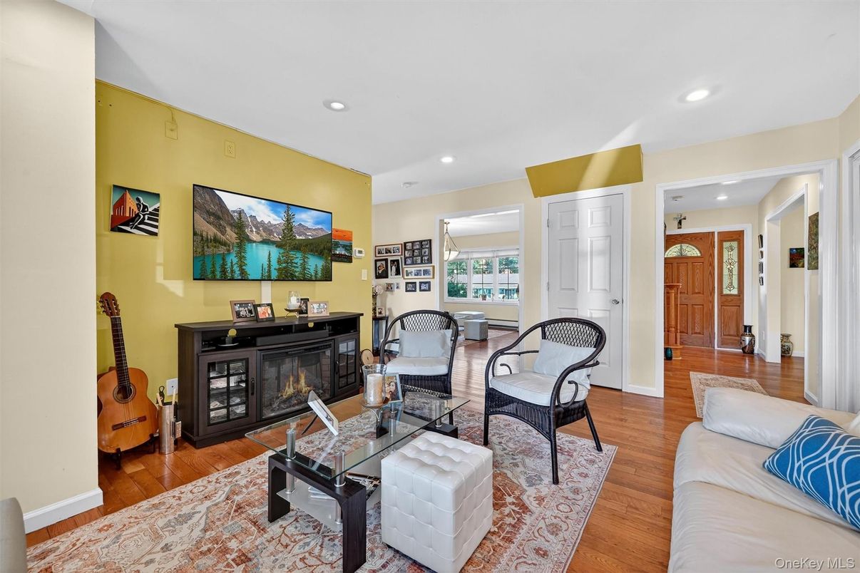 Fireplace, Interior, Living room, Recessed Lighting, Wood Texture Flooring