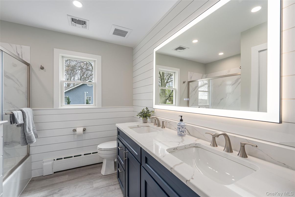 Bathroom, Dual Sink Vanities, Interior, Recessed Lighting, Wood Texture Flooring
