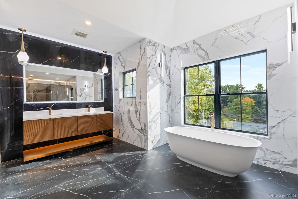 Bathroom, Dual Sink Vanities, Free Standing Baths, Glass Shower, Interior, Marble, Marble Walls, Pendant Lights, Recessed Lighting