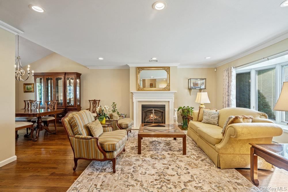 Chandelier, Dining room, Fireplace, Interior, Living room, Recessed Lighting, Wood Texture Flooring