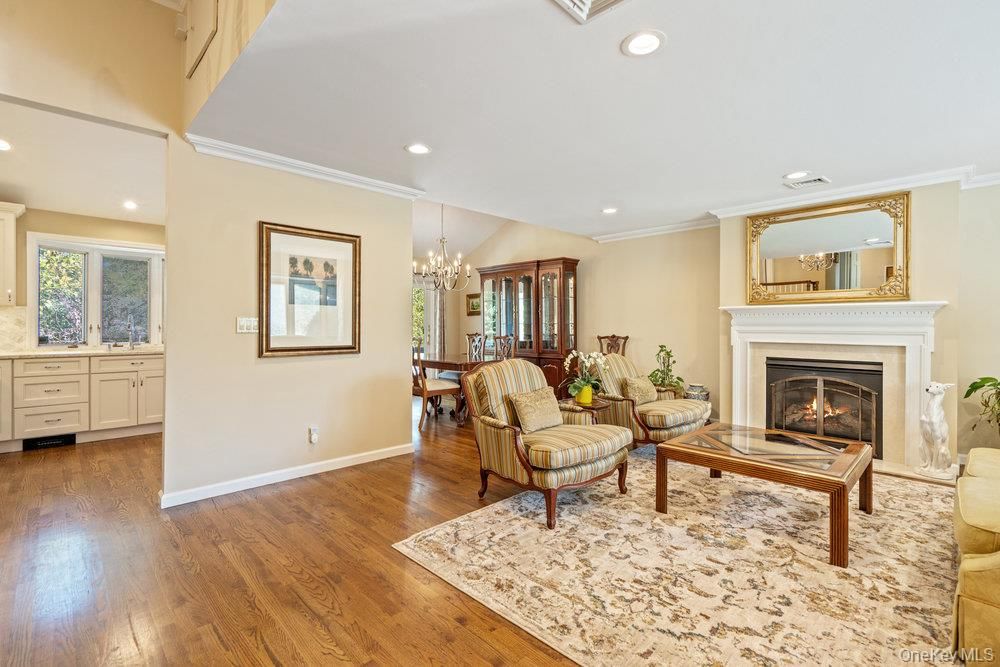 Chandelier, Dining room, Fireplace, Interior, Living room, Recessed Lighting, Wood Texture Flooring