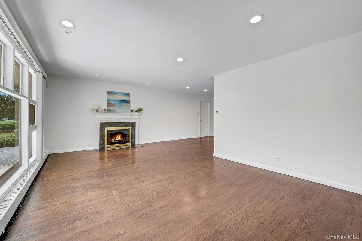Empty room, Fireplace, Interior, Recessed Lighting, Wood Texture Flooring