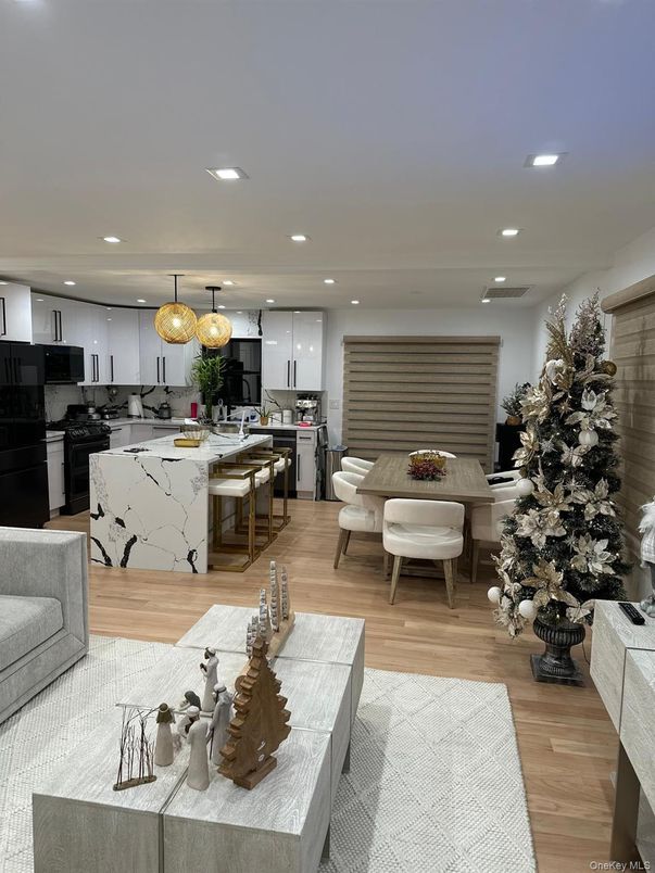 Dining room, Interior, Kitchen, Pendant Lights, Recessed Lighting, Stainless Steel Appliances, Wood Texture Flooring