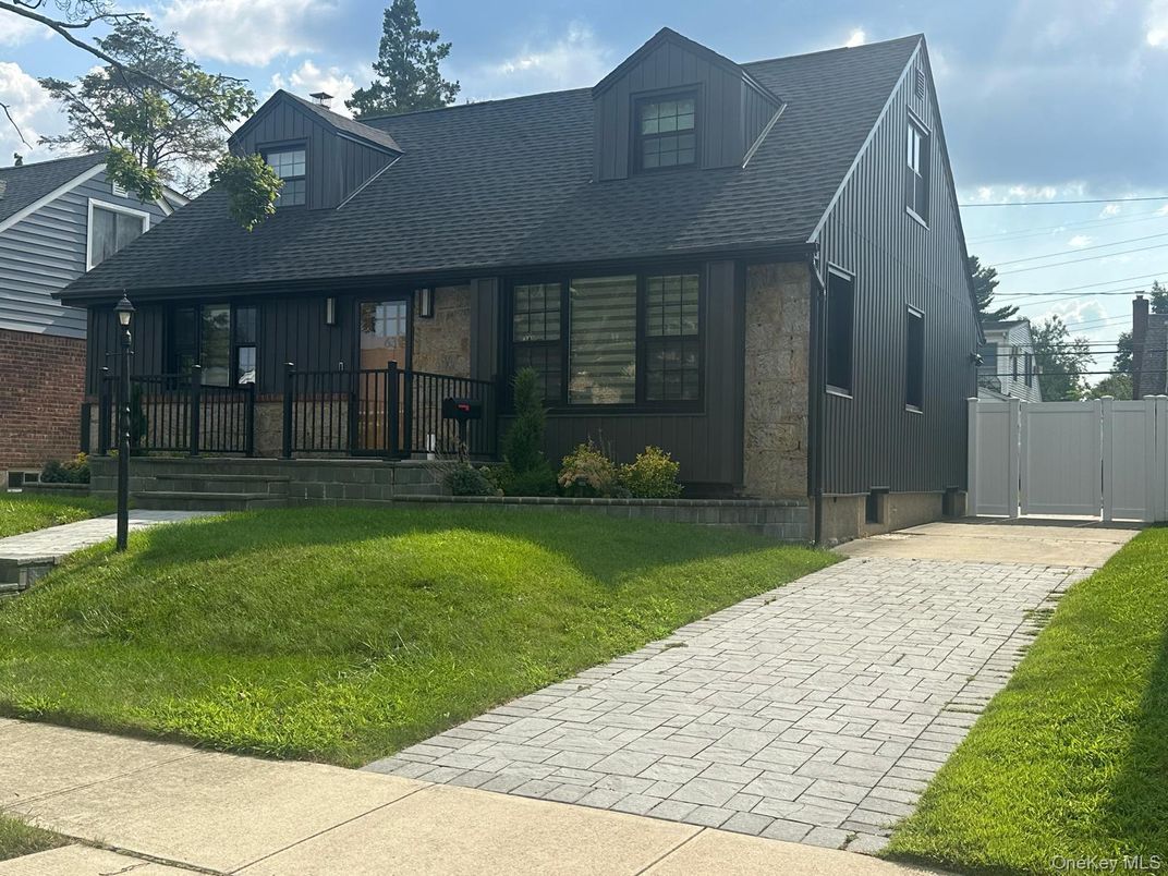 Exterior, Facade, Brick Facade, Cape Cod
