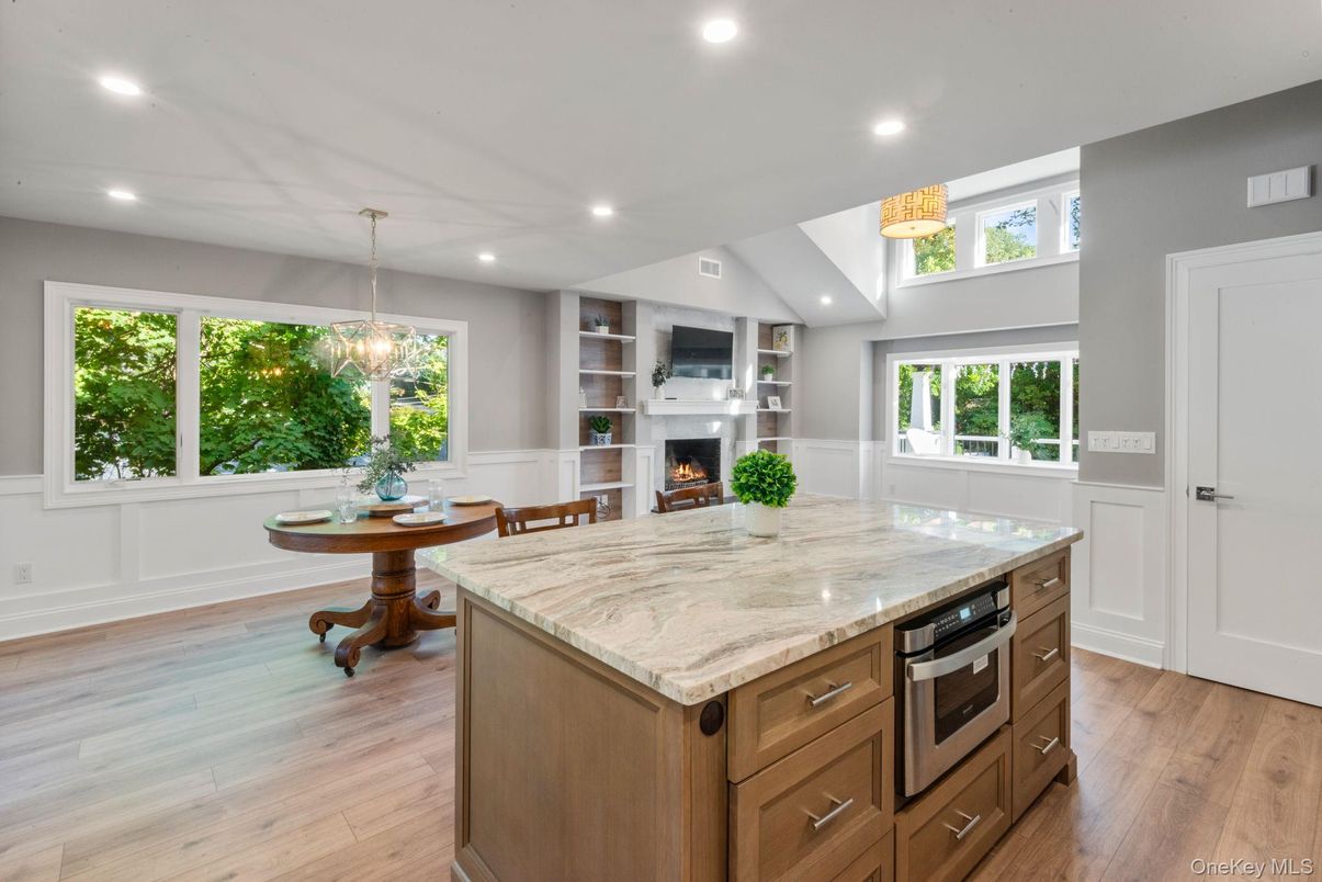 Chandelier, Fireplace, Interior, Kitchen, Pendant Lights, Recessed Lighting, Wood Texture Flooring