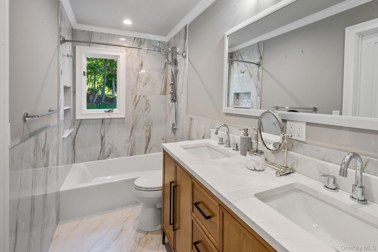 Bathroom, Dual Sink Vanities, Interior, Marble, Marble Walls, Recessed Lighting
