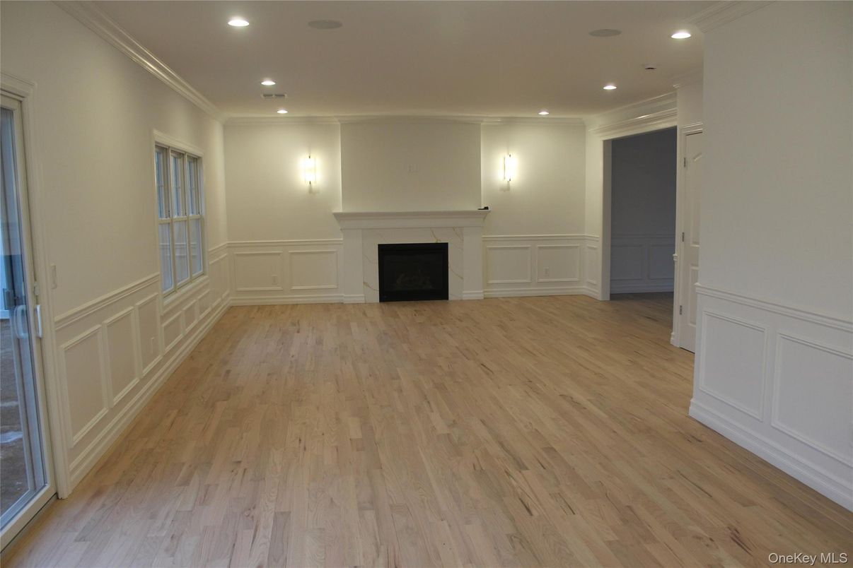 Empty room, Fireplace, Interior, Recessed Lighting, Wood Texture Flooring