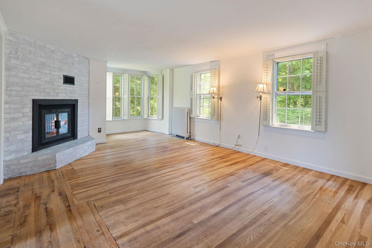 Empty room, Fireplace, Interior, Stone Walls, Wood Texture Flooring