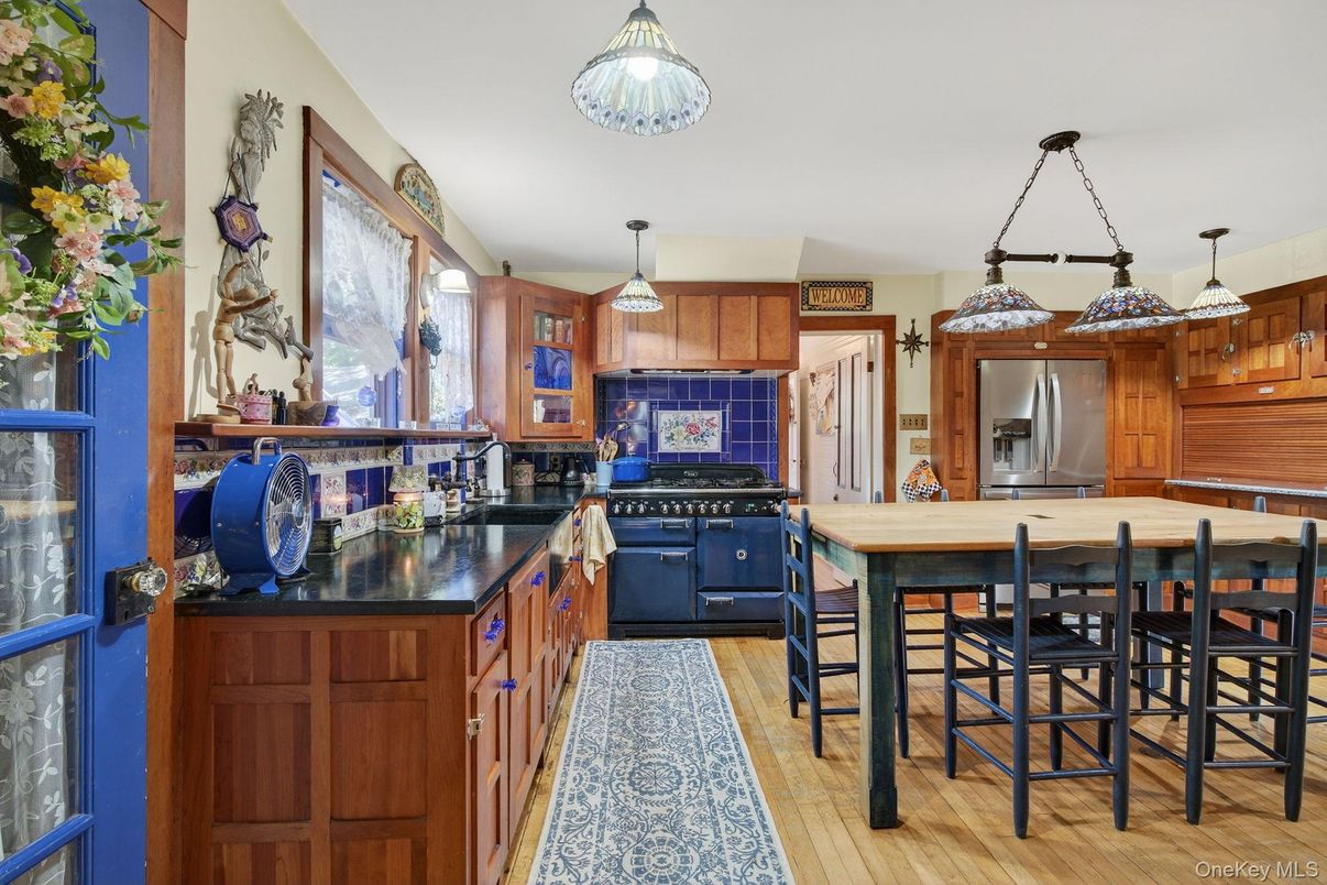 Dining room, Interior, Kitchen, Pendant Lights, Stainless Steel Appliances, Wood Texture Flooring