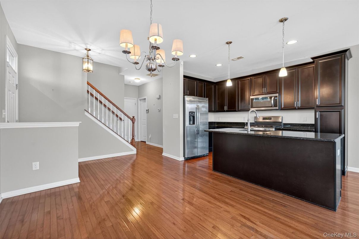 Chandelier, Interior, Kitchen, Pendant Lights, Recessed Lighting, Stainless Steel Appliances, Wood Texture Flooring