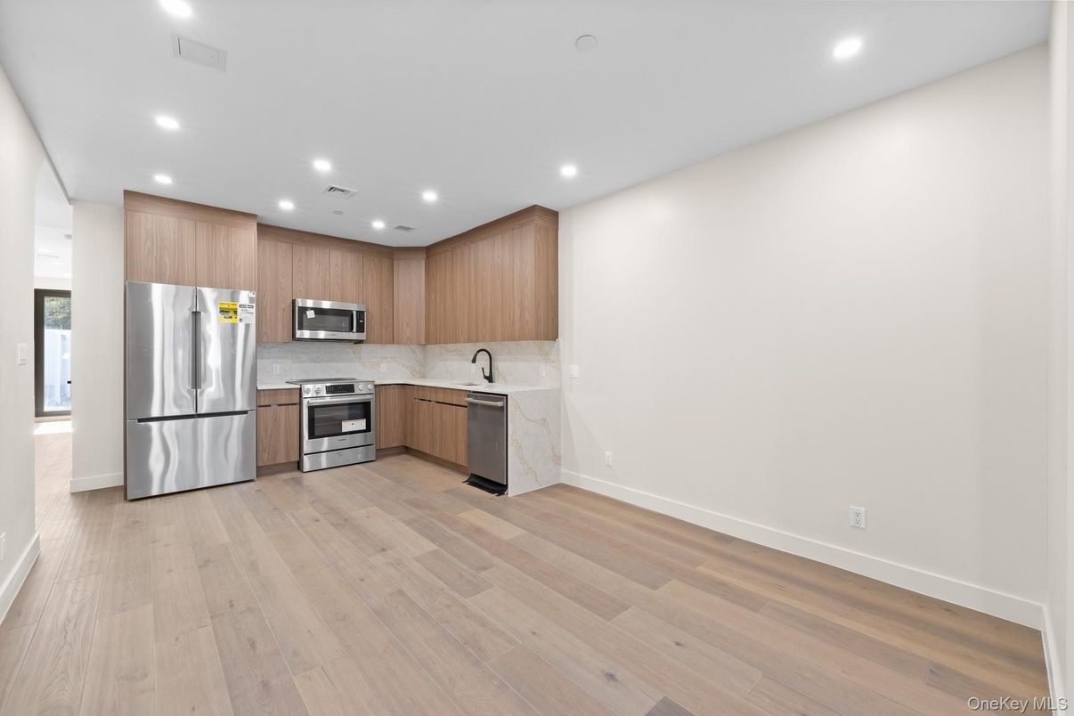 Interior, Kitchen, Recessed Lighting, Stainless Steel Appliances, Wood Texture Flooring