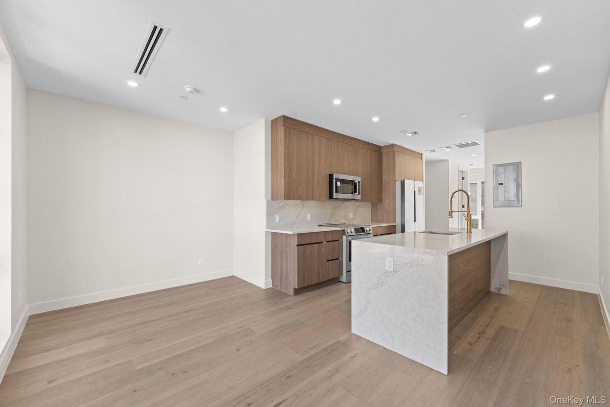 Interior, Kitchen, Recessed Lighting, Stainless Steel Appliances, Wood Texture Flooring