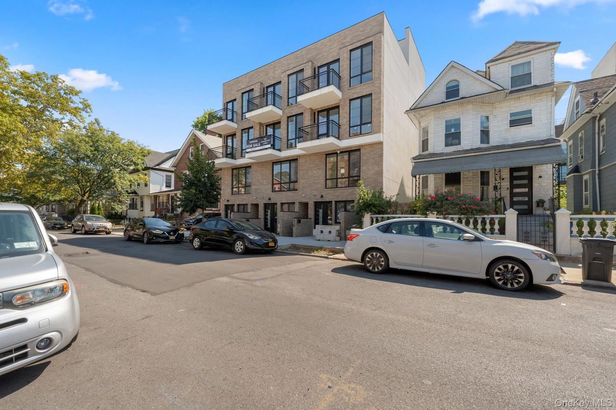 Exterior, Facade, Brick Facade, Condo Building