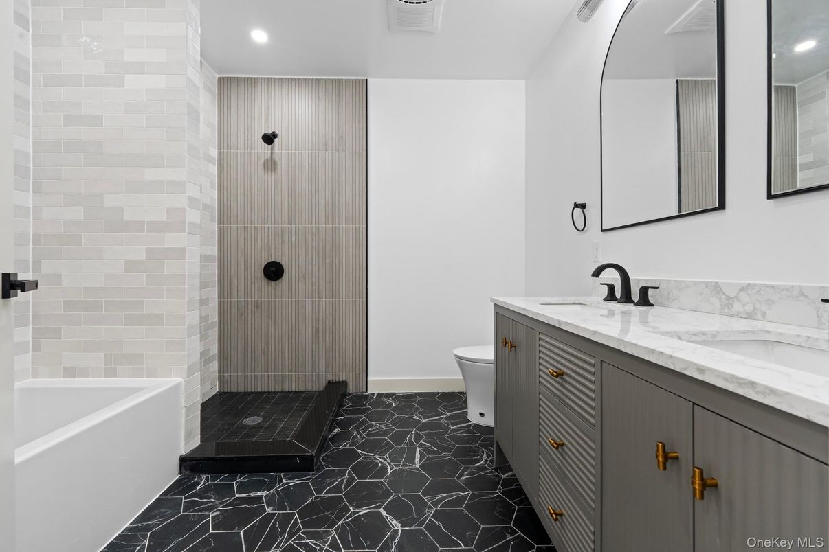 Bathroom, Dual Sink Vanities, Glass Shower, Interior, Marble, Recessed Lighting