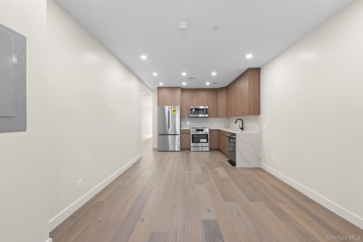 Interior, Kitchen, Recessed Lighting, Stainless Steel Appliances, Wood Texture Flooring