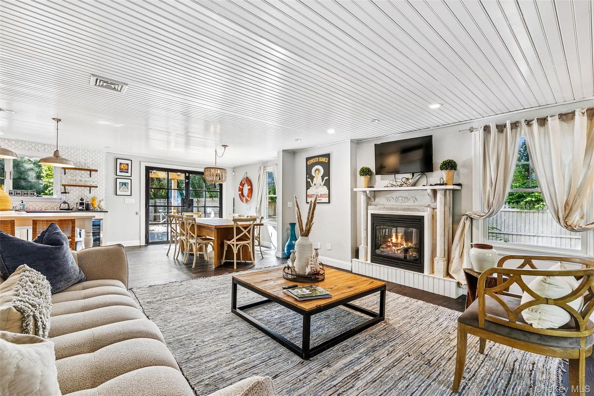 Dining room, Fireplace, Interior, Kitchen, Living room, Pendant Lights, Recessed Lighting, Wood Texture Flooring
