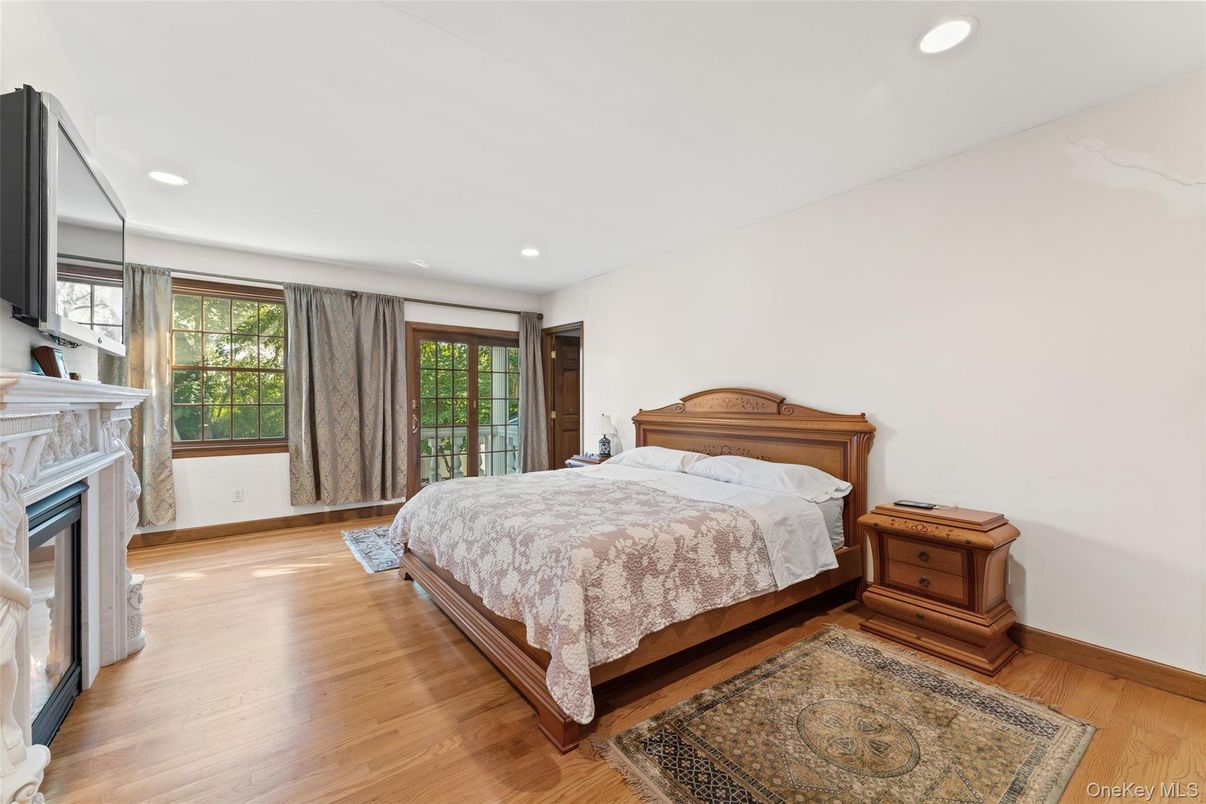 Bedroom, Fireplace, Interior, Recessed Lighting, Wood Texture Flooring