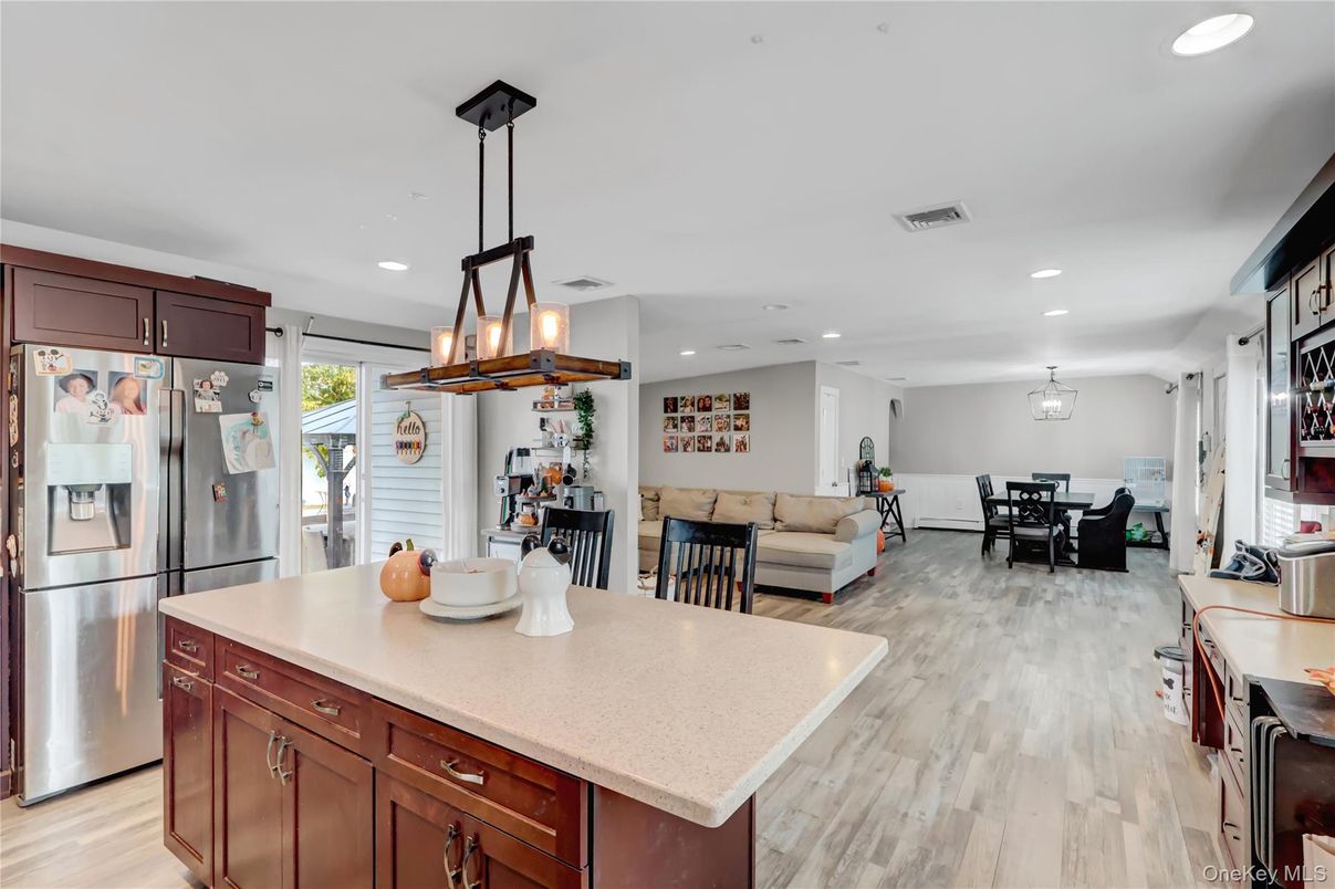 Chandelier, Dining room, Interior, Kitchen, Living room, Pendant Lights, Recessed Lighting, Wood Texture Flooring