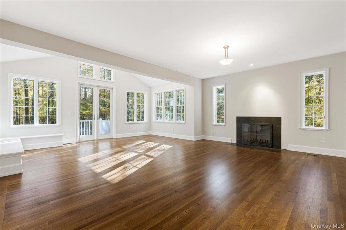 Empty room, Fireplace, Interior, Pendant Lights, Recessed Lighting, Wood Texture Flooring