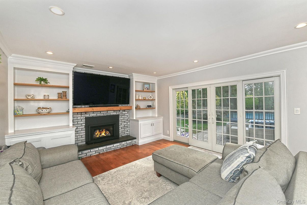Fireplace, Interior, Living room, Recessed Lighting, Wood Texture Flooring
