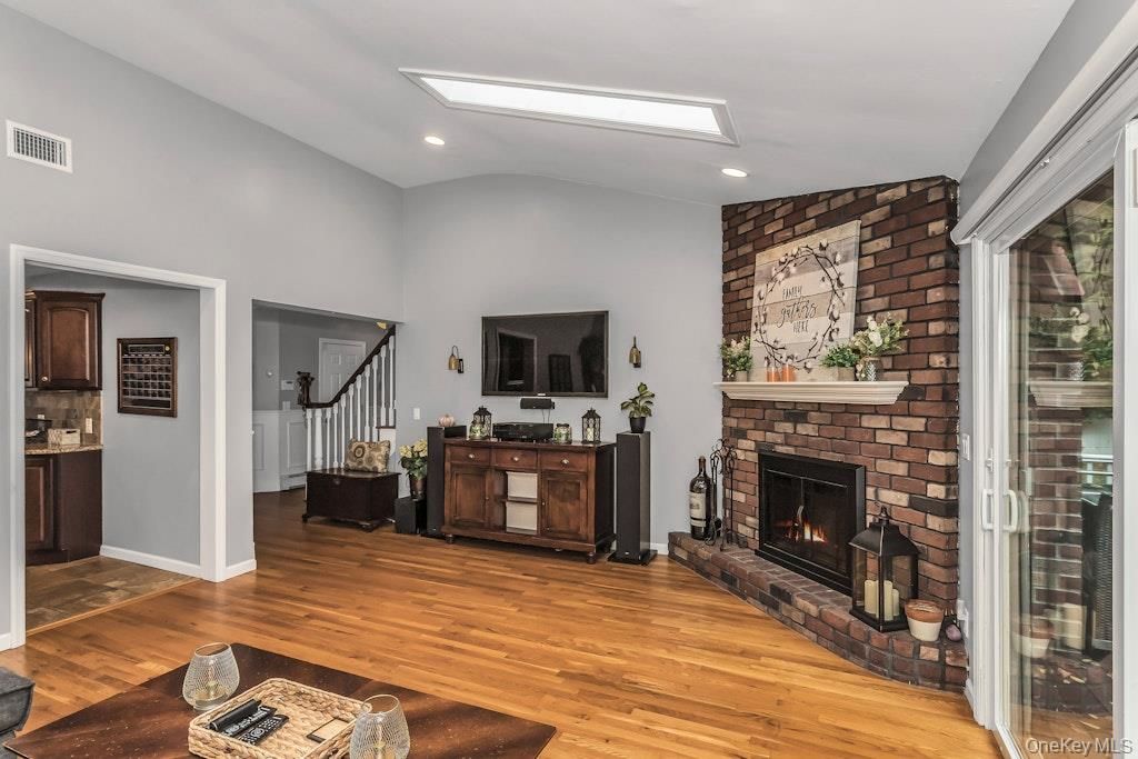 Fireplace, Interior, Recessed Lighting, Stone Walls, Wood Texture Flooring