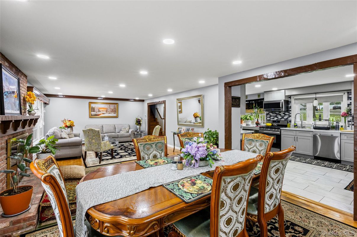 Dining room, Interior, Kitchen, Living room, Recessed Lighting, Stainless Steel Appliances, Wood Texture Flooring
