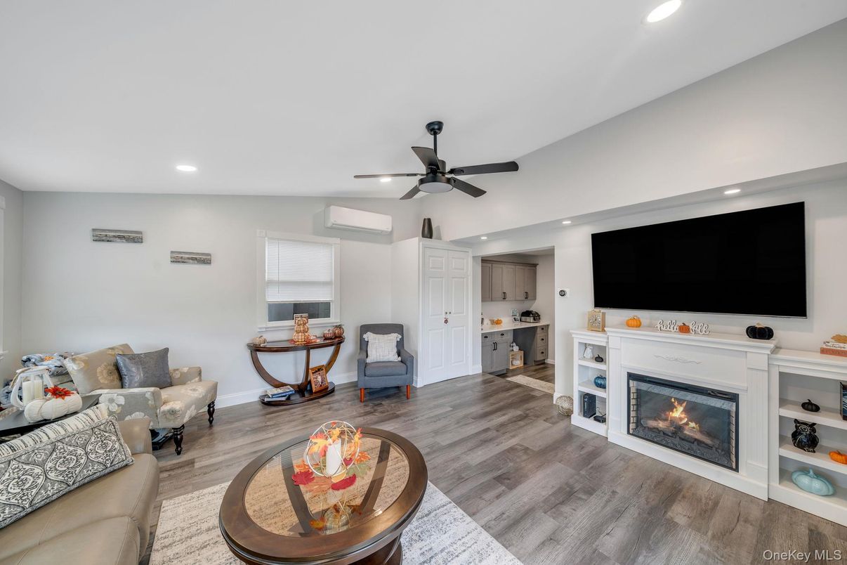 Fireplace, Interior, Living room, Recessed Lighting, Wood Texture Flooring
