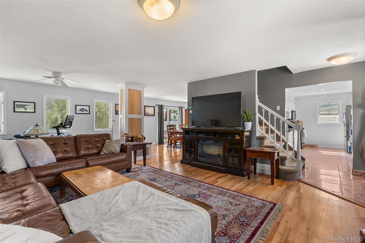 Fireplace, Fitness Equipment, Interior, Living room, Wood Texture Flooring