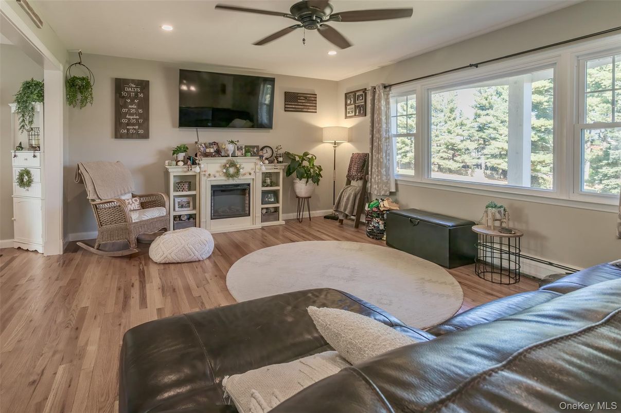 Fireplace, Interior, Living room, Recessed Lighting, Wood Texture Flooring