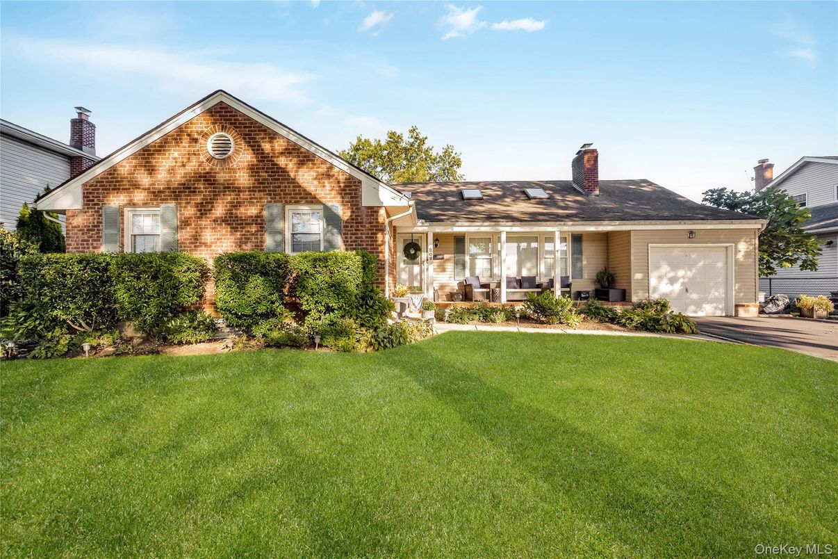 Attached, Backyard, Exterior, Facade, Brick Facade, Ranch