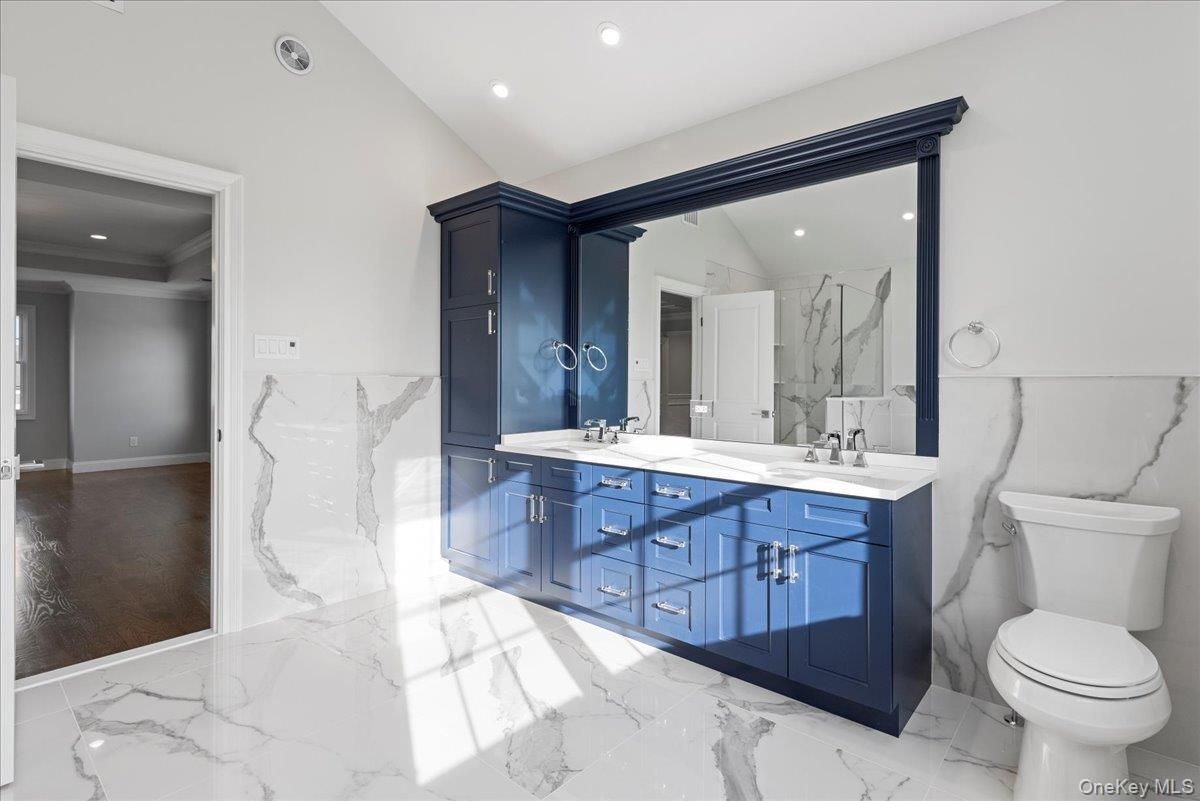 Bathroom, Dual Sink Vanities, Interior, Marble, Marble Walls, Recessed Lighting
