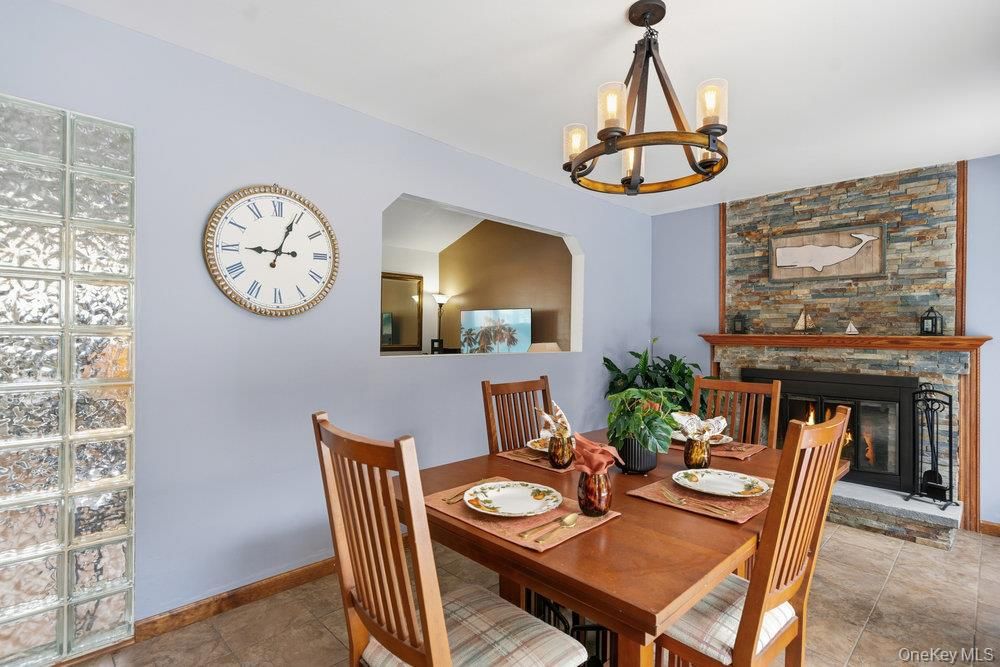 Dining room, Fireplace, Interior, Pendant Lights, Stone Walls