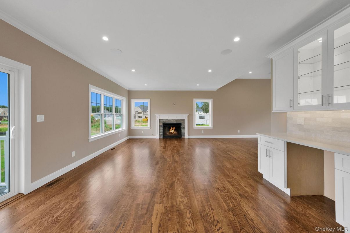 Empty room, Fireplace, Interior, Recessed Lighting, Wood Texture Flooring