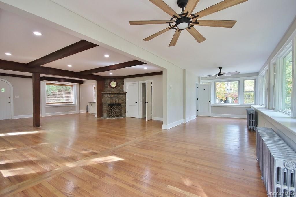 Empty room, Fireplace, Interior, Recessed Lighting, Wooden Beams, Wood Texture Flooring