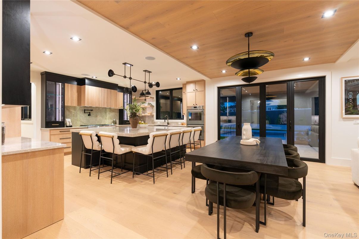 Dining room, Interior, Kitchen, Pendant Lights, Recessed Lighting, Stainless Steel Appliances, Wooden Ceilings, Wood Texture Flooring