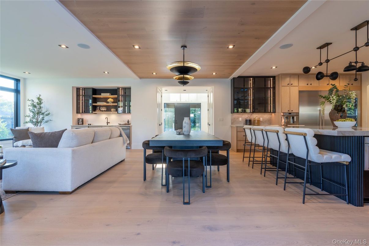 Dining room, Interior, Kitchen, Living room, Pendant Lights, Recessed Lighting, Stainless Steel Appliances, Wooden Ceilings, Wood Texture Flooring