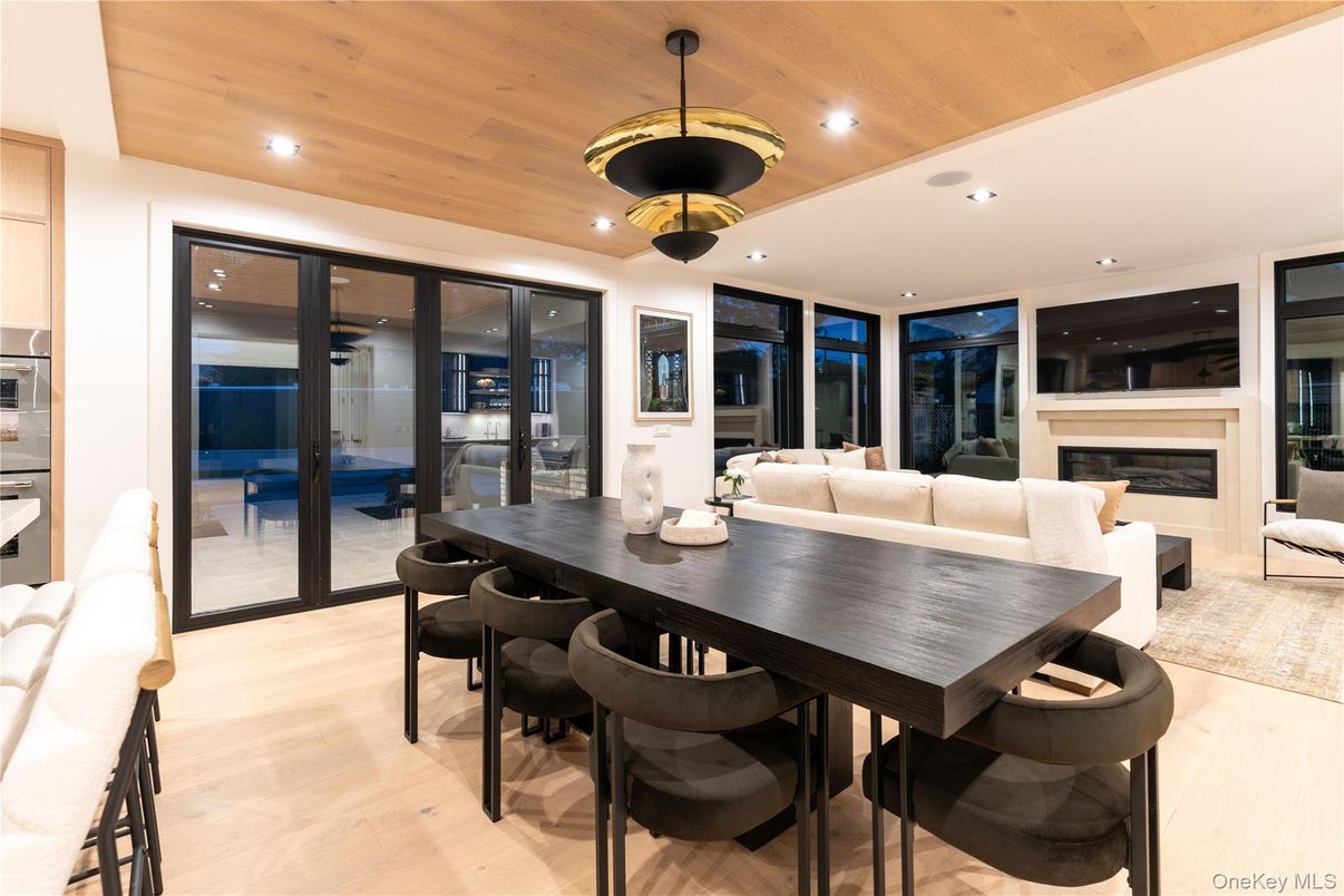 Dining room, Fireplace, Interior, Living room, Pendant Lights, Recessed Lighting, Wooden Ceilings, Wood Texture Flooring