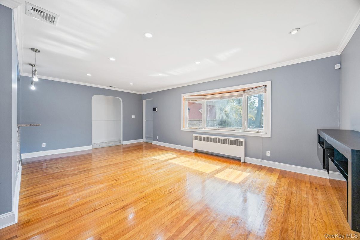 Empty room, Fireplace, Interior, Pendant Lights, Recessed Lighting, Wood Texture Flooring