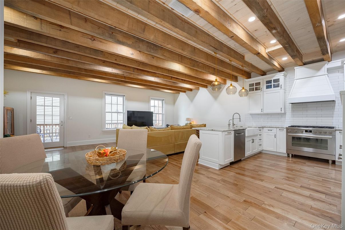 Dining room, Interior, Kitchen, Living room, Recessed Lighting, Stainless Steel Appliances, Wooden Beams, Wooden Ceilings, Wood Texture Flooring