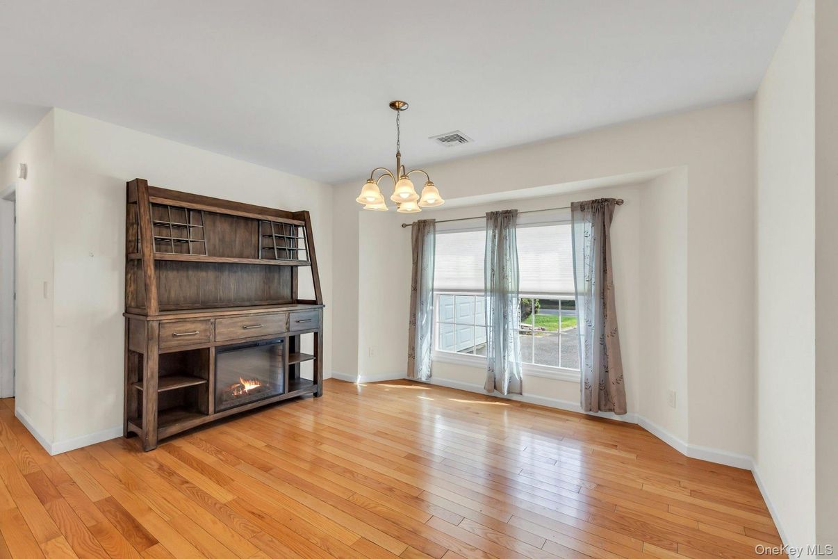 Empty room, Fireplace, Interior, Pendant Lights, Wood Texture Flooring