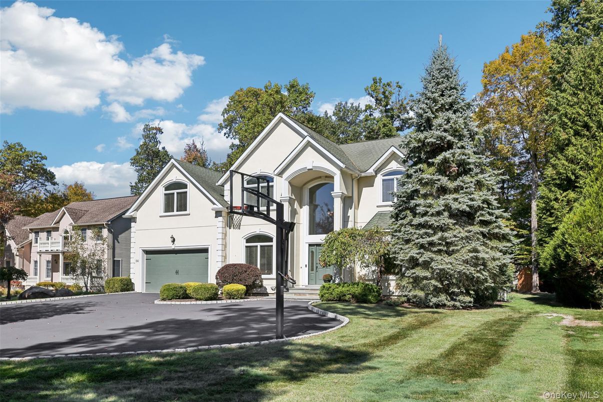 Attached, Exterior, Facade, Tudor Revival