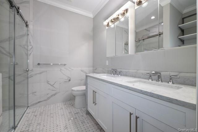 Bathroom, Dual Sink Vanities, Glass Shower, Interior, Marble Walls, Recessed Lighting