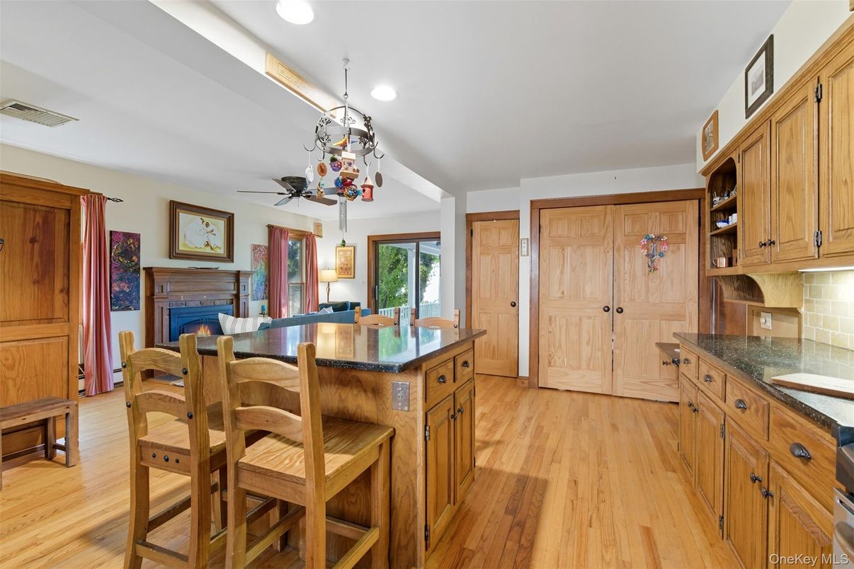 Dining room, Fireplace, Interior, Recessed Lighting, Wood Texture Flooring