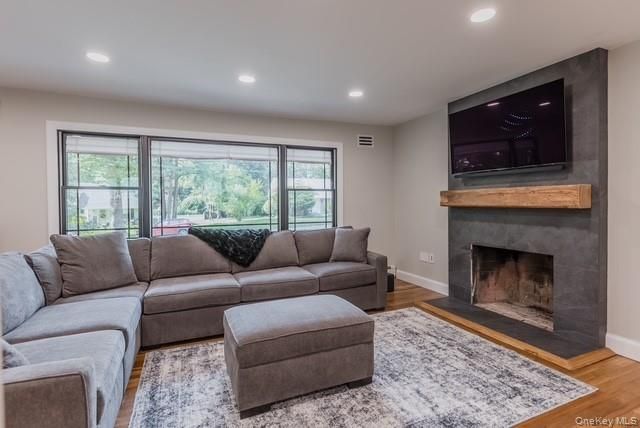 Fireplace, Interior, Living room, Recessed Lighting, Wood Texture Flooring