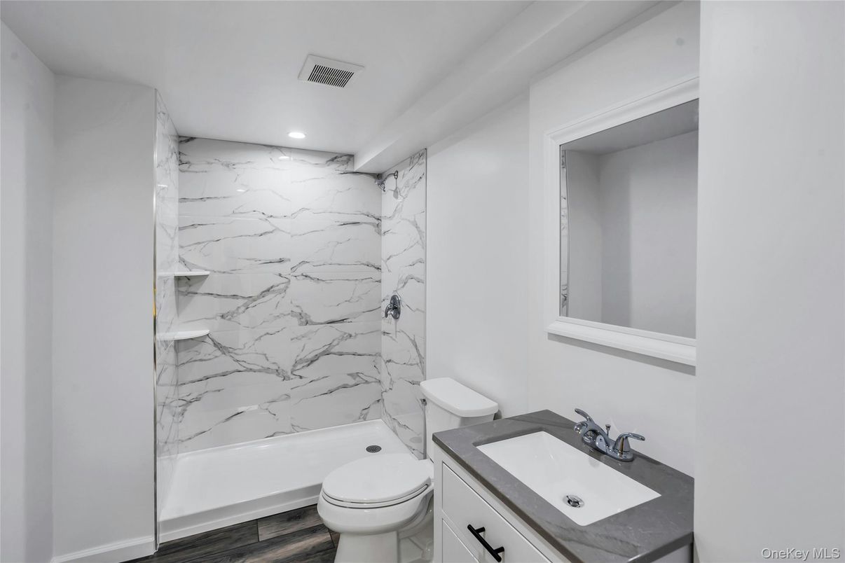 Bathroom, Interior, Marble Walls, Recessed Lighting, Wood Texture Flooring