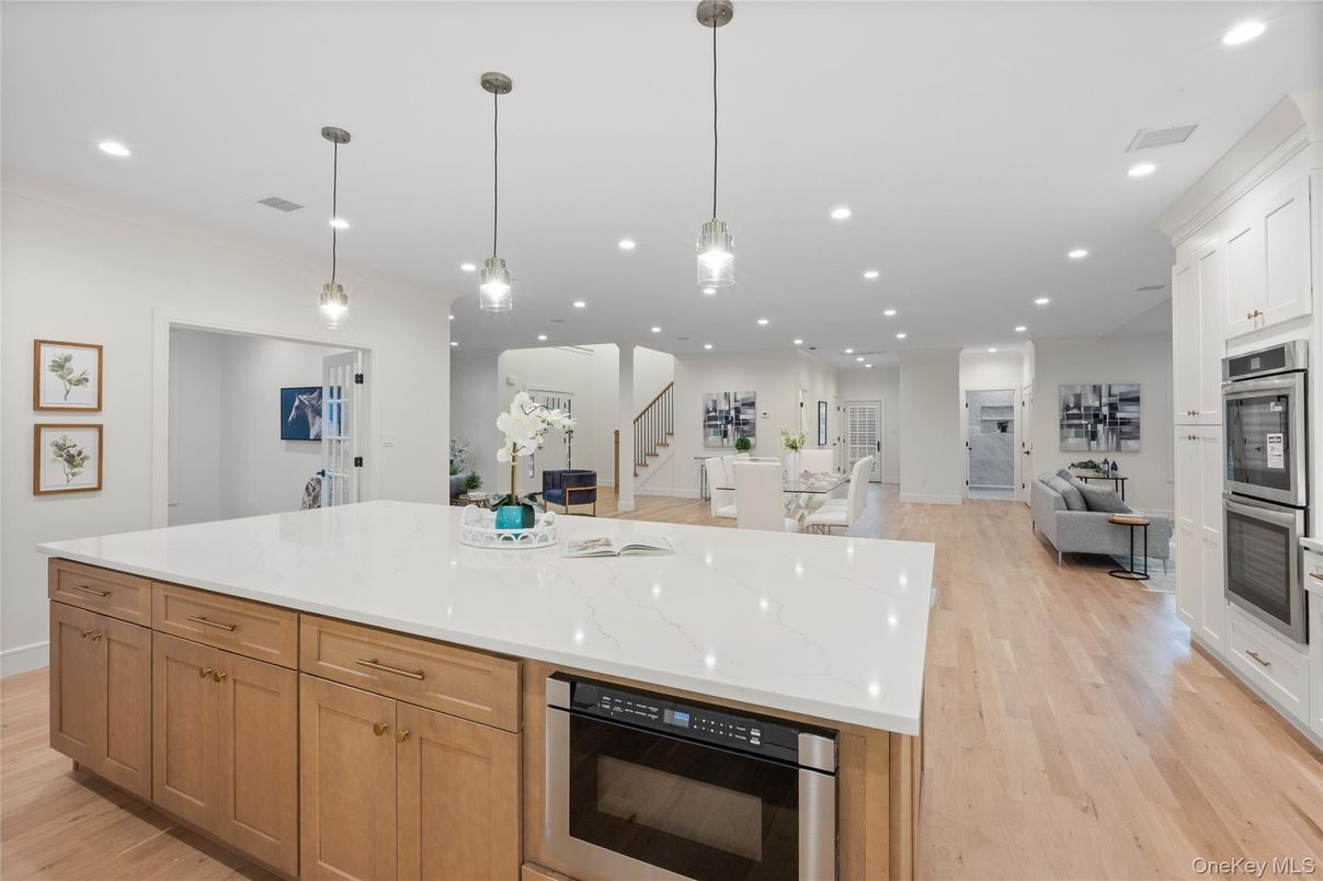 Dining room, Interior, Kitchen, Living room, Pendant Lights, Recessed Lighting, Stainless Steel Appliances, Wood Texture Flooring